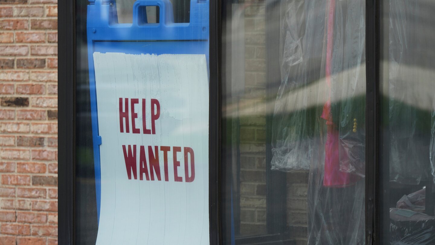 US applications for jobless benefits fell below 200,000 last week with layoffs historically low