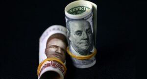 Naira gains N0.80 against dollar at official window