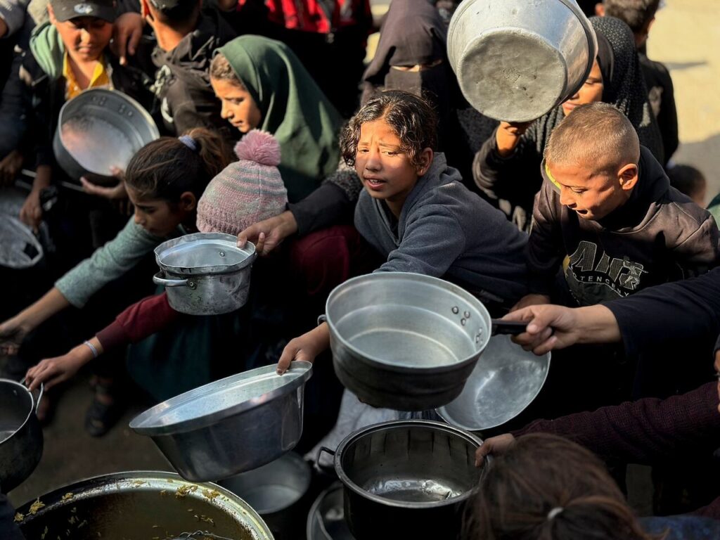 Israel will ban dozens of aid groups from Gaza starting on New Year’s Day