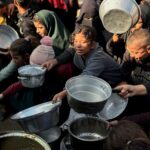 Israel will ban dozens of aid groups from Gaza starting on New Year’s Day