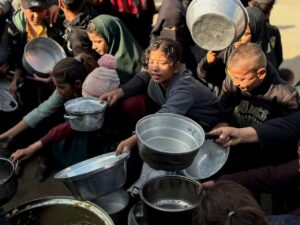 Israel will ban dozens of aid groups from Gaza starting on New Year’s Day