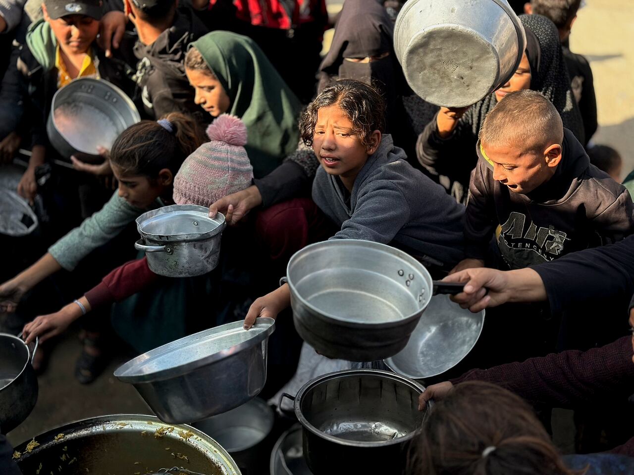 Israel will ban dozens of aid groups from Gaza starting on New Year’s Day