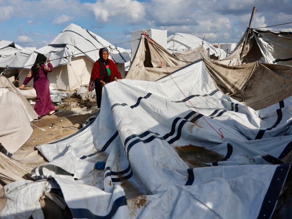 Gaza storm kills Palestinian woman as Israeli curbs on aid compound misery