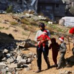 Israeli forces kill Palestinian in Gaza, carry out raids across West Bank