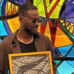 Adekunle Gold Receives Plaque for Historic Sold-Out Show at Renovated National Theatre