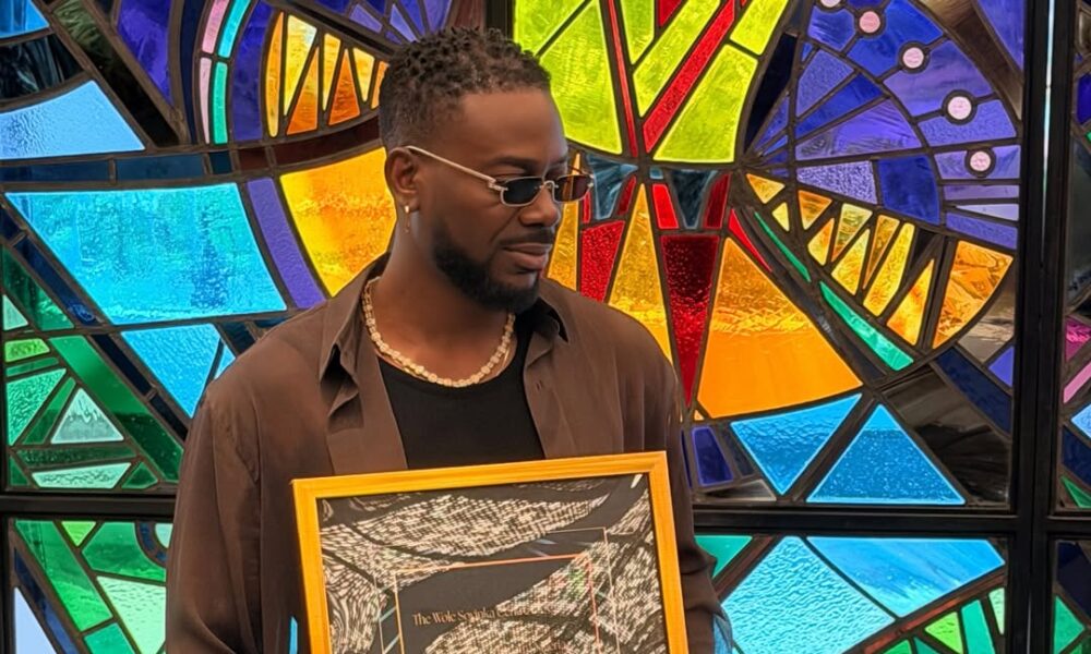 Adekunle Gold Receives Plaque for Historic Sold-Out Show at Renovated National Theatre