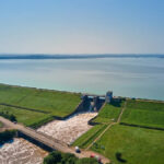 Officials on alert as major dam climbs toward maximum capacity amid downpours: ‘A strong buffer for … water supply’