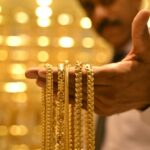 Asia markets edge up as precious metals surge