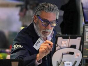 US futures slip while Asian shares surge as Fed chair Powell faces legal threat