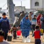 Palestinian president calls for Israel to lift barriers to phase two of Gaza truce