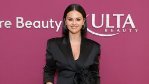 Selena Gomez’s Silky, Waist-Cinching Dress Look Is Perfect for the Office