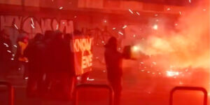 Rioters set off fireworks, throw smoke bombs at police in Milan during anti-Olympics unrest