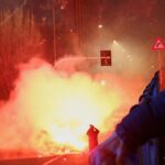 Italian police fire tear gas at protesters near Olympics venue