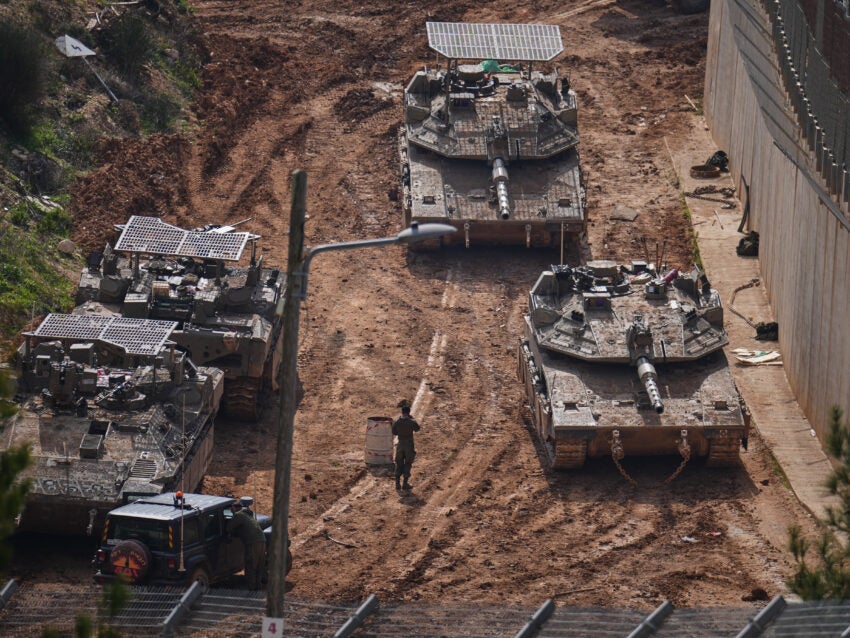 U.S. sinks Iranian warship as Iran warns of widespread destruction in the Middle East