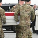 Trump salutes as 6 soldiers killed in Iran are transferred back to the U.S.