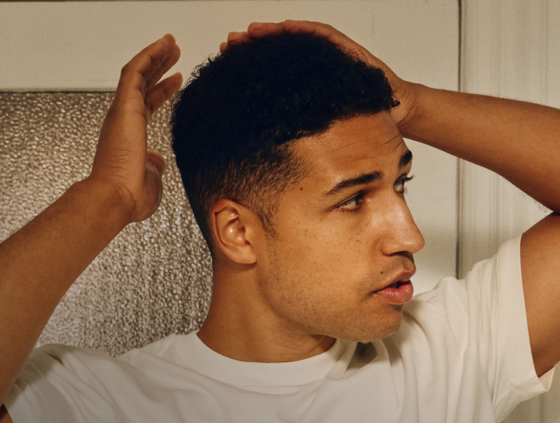 A Comprehensive Guide on How to Style and Care for Curly Hair as a Guy