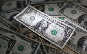 Dollar set for best week in four months on hawkish Fed, geopolitics