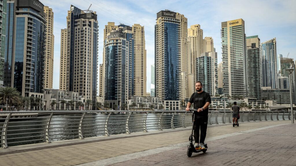 Iranians in Dubai torn between hopes for change and fear for loved ones amid Iran war