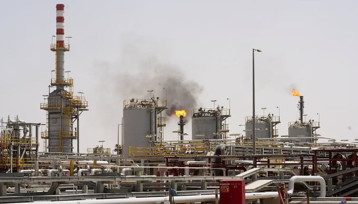 Oil climbs as strikes on Saudi facilities stoke anxiety, Hormuz near standstill