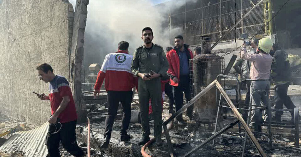 Iranian military helicopter crashes into fruit market, four dead