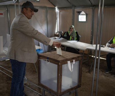 Palestinians in Gaza vote in first election in 20 years