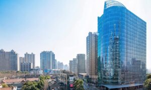 CalPERS-Backed Fund Sells Office Tower Near Shanghai’s Xintiandi at 43% Off