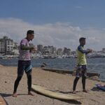 Surfers in war-torn Gaza find rare moments of joy taking to the waves