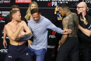 Carlos Prates held back as he tries to get at Jack Della Maddalena in heated face off: ‘Why you scared?’