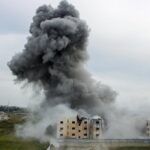 U.S. military bombs Iran’s main oil export hub, as Mideast war toll mounts