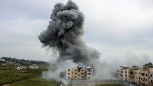U.S. military bombs Iran’s main oil export hub, as Mideast war toll mounts
