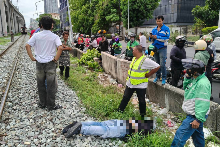 Man climbs city railway barrier, injured by train