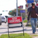 US filings for jobless aid tick up last week to 210,000 but remain at healthy levels