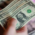Dollar climbs for fifth straight day as Fed rate hike bets grow