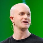 Coinbase Cuts 14% of Staff as AI and Crypto Downturn Reshape Its Operating Model