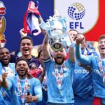 Coventry celebrate title party with win as Wrexham sweat on play-offs