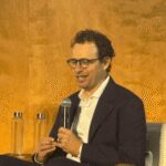 Dario Amodei spent last year warning of an AI white-collar bloodbath. Now he’s changing the narrative