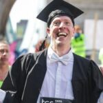 Oxford professor’s world record marathon in academic dress shows fun side