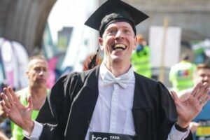 Oxford professor’s world record marathon in academic dress shows fun side