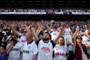 In pictures: Jubilant Tottenham fans celebrate Premier League survival after1-0 win over Everton