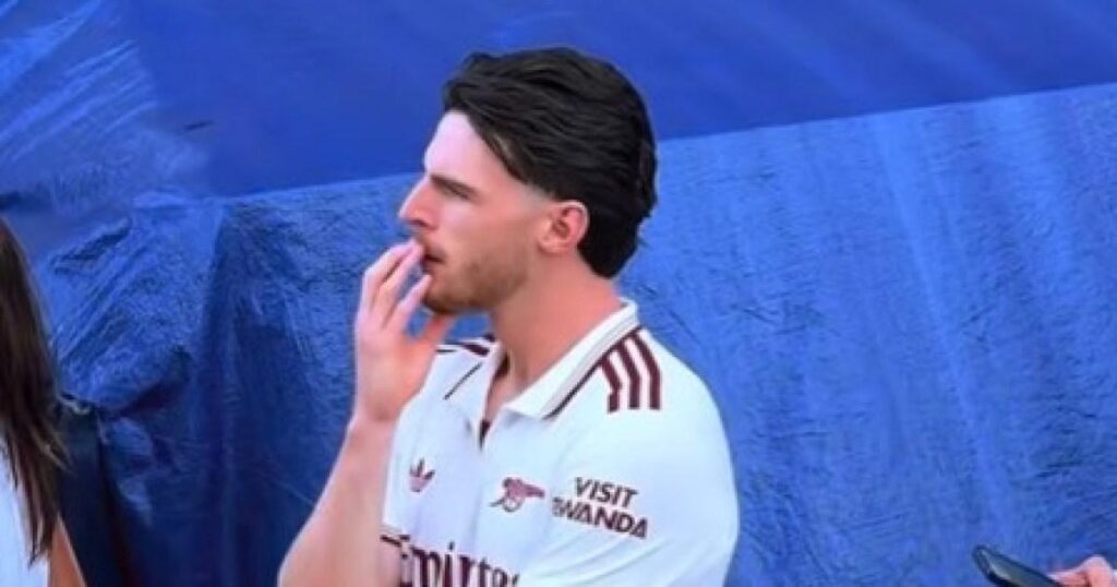 Declan Rice reacts to West Ham relegation during Arsenal title celebrations