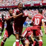 Qatar score late to clinch draw with stunned Switzerland​