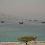 Iran peace deal looms while new military action flares near Strait of Hormuz