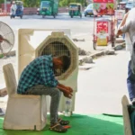 Heat wave empties roads and markets in north India as some farmers turn to nighttime work