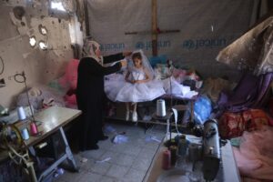 Hope in a dress: Recycled gowns bring moments of escape in Gaza
