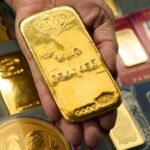 Why is the price of gold trending down?