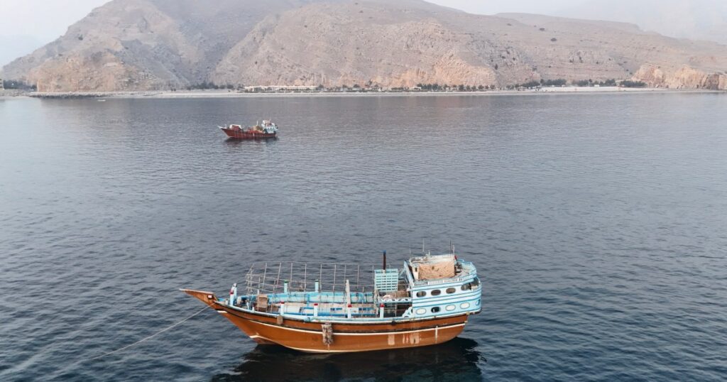 Iranian drones attack Bahrain and a ship is struck in the strait after U.S. airstrikes