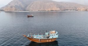 Iranian drones attack Bahrain and a ship is struck in the strait after U.S. airstrikes