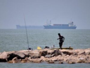 Iranian drones attack Bahrain and a ship is struck in the strait after US airstrikes