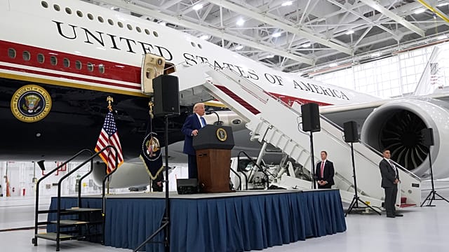 Oil ‘pouring through’ Strait of Hormuz, Trump says, as he unveils new Air Force One